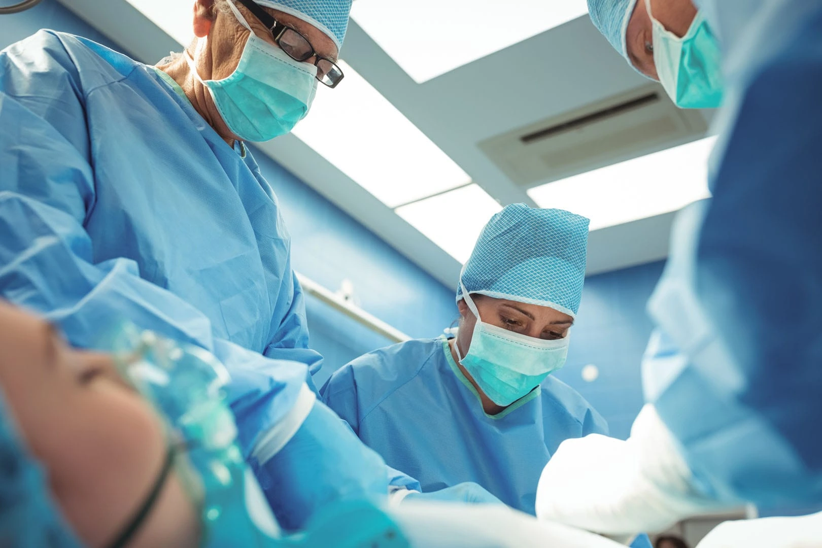 team-surgeons-performing-operation-operation-theater-min